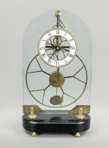 Modern skeleton clock with unusual scissor escapement, this may well be a master or journeyman's