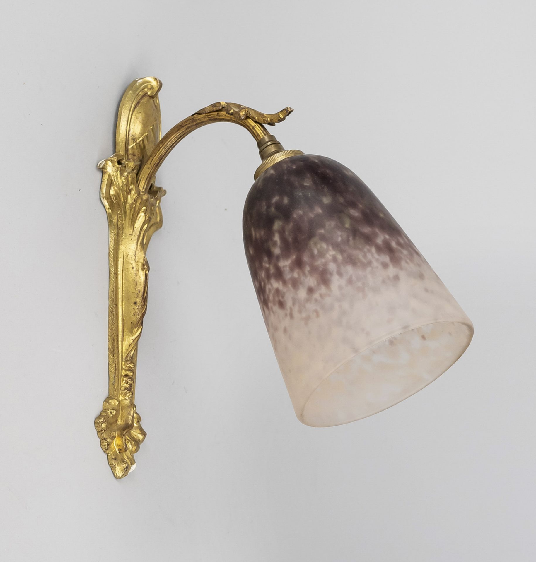 Wall lamp, Schneider, c. 1920, ornamented wall section with residual gilding, frosted glass