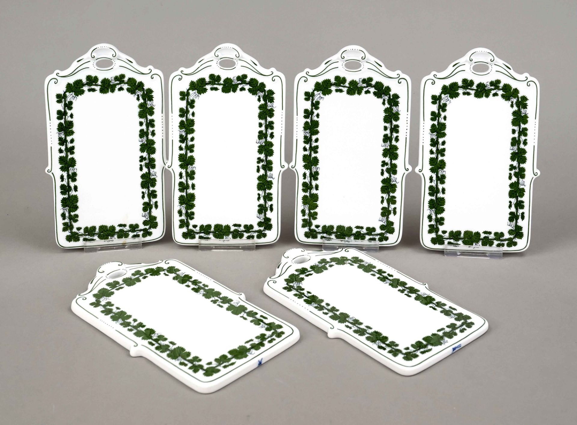Six breakfast trays, Meissen, 20th century, 1st choice, vine leaf decoration in underglaze green, l.