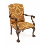 Armchair from around 1920, walnut, carved frame, armrest ends in the shape of lion heads, 103 x 67 x
