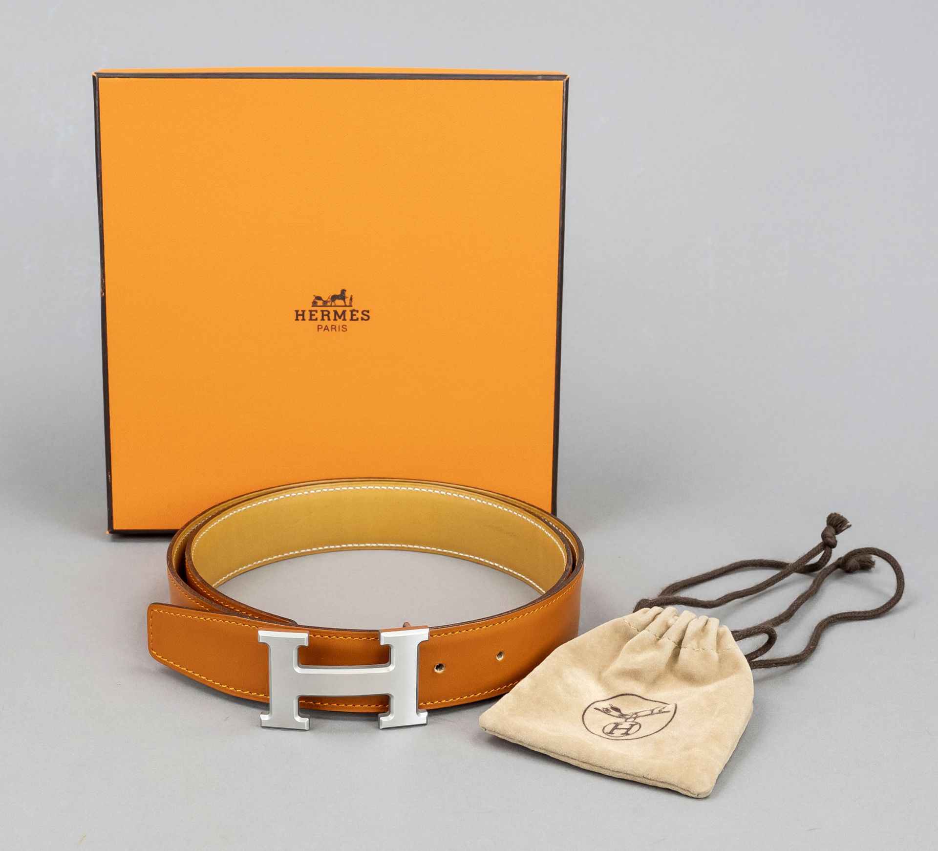 Hermes, reversible belt, orange and toffee-coloured leather, one side with white contrasting