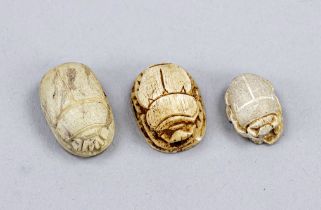 3 scarabs, probably ancient Egyptian, the undersides with carved hyroglyphs, d. up to 1.8 cm
