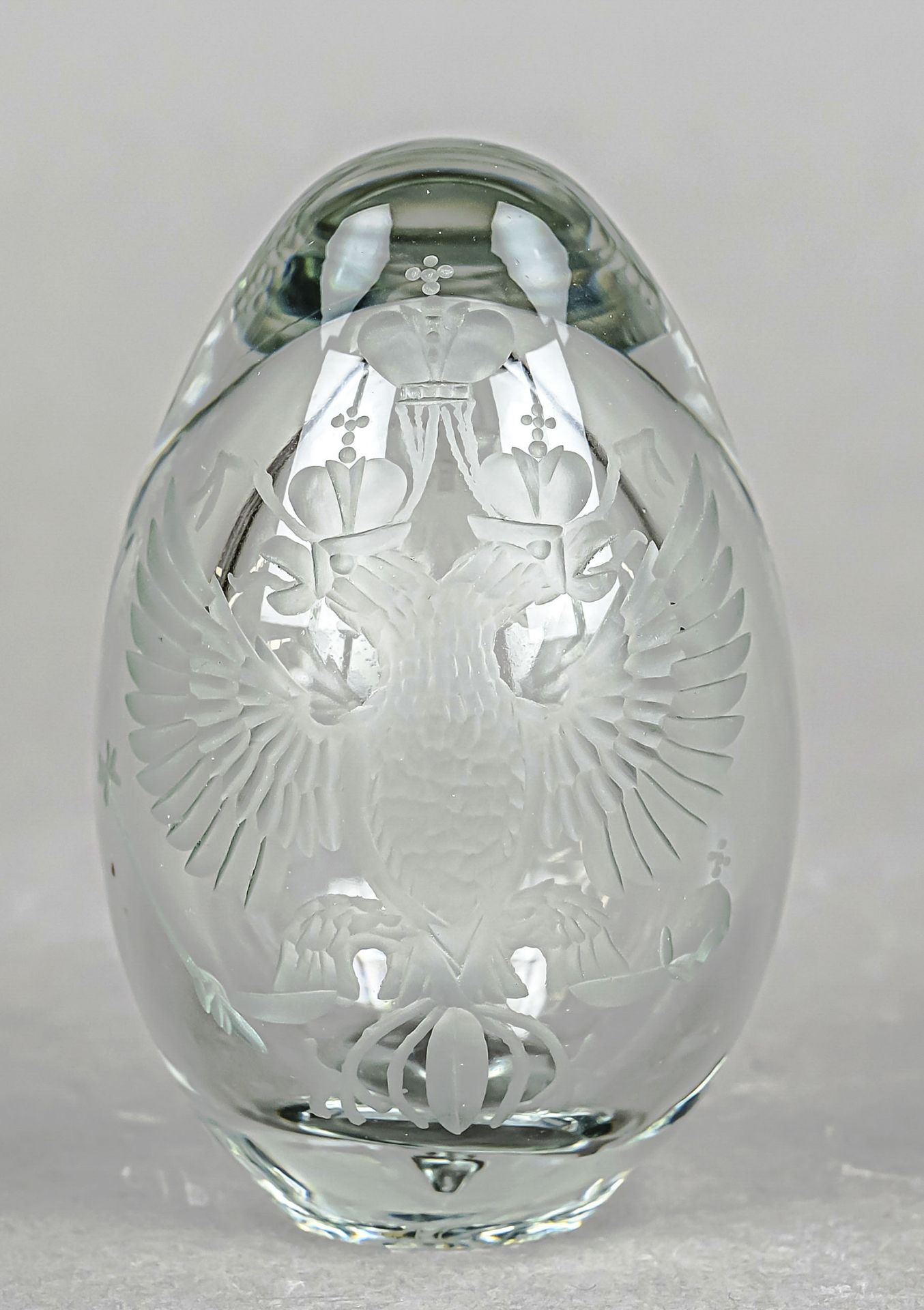 Paperweight, Russia, early 20th century, egg-shaped, clear glass with cut decoration, double