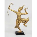 Large temple dancer, Thailand, 19th/20th century, gilt bronze. Balancing on one leg and drawing a