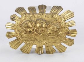 Decorative mount/application, late 19th century, brass with residual gilding. 3 cherubs in woolen