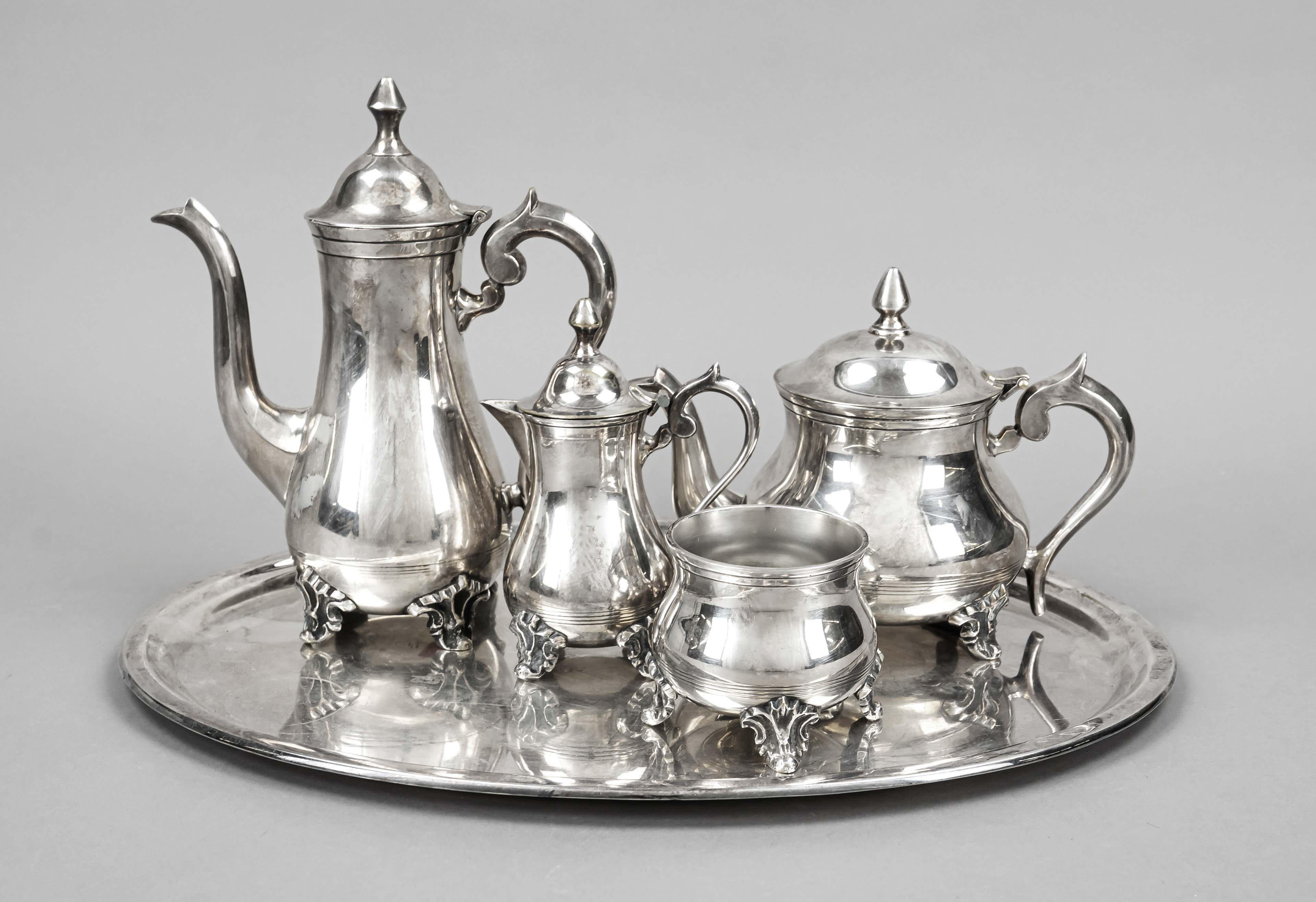 A four-piece coffee and tea centerpiece on an oval tray, England, 20th century, plated, on 4