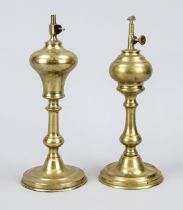 Pair of oil lamps, 19th century, brass. Round, profiled base, baluster shaft, spherical bowl. One of