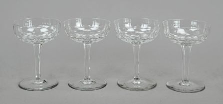 Four champagne bowls, France, 2nd half 20th century, Baccarat, round disk stand, angular slender