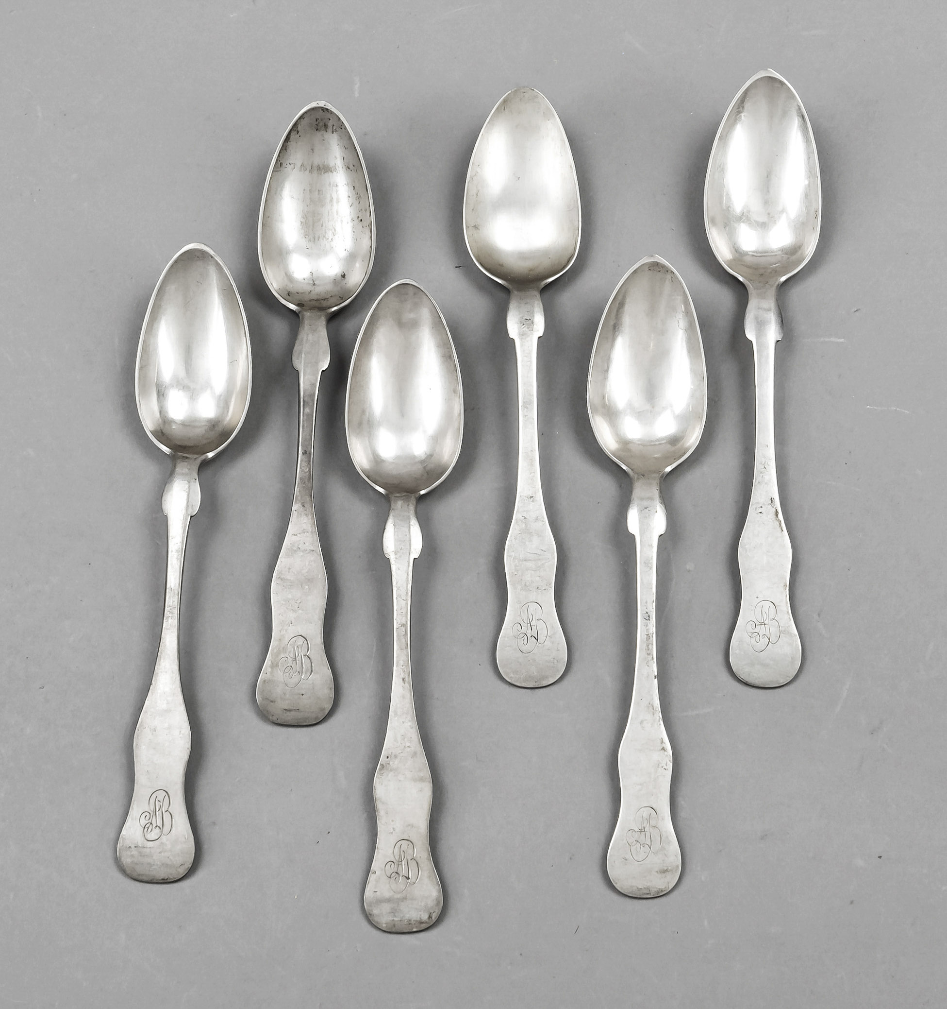 Eleven teaspoons, late 19th century, plated, violin shape, mostly with monogram, l. 16 cm