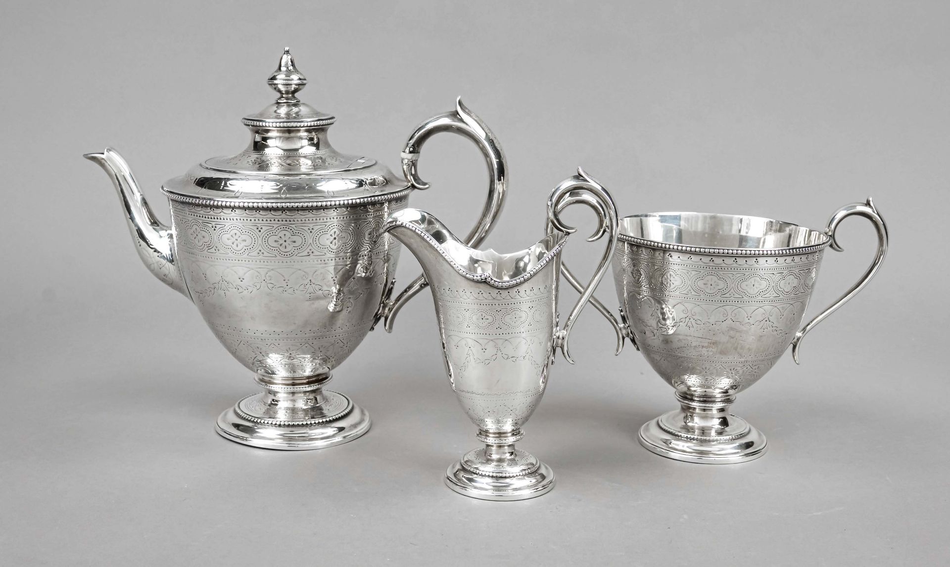 A three-piece tea pot, England, 1865, maker's mark Edward & John Barnard, London, sterling silver