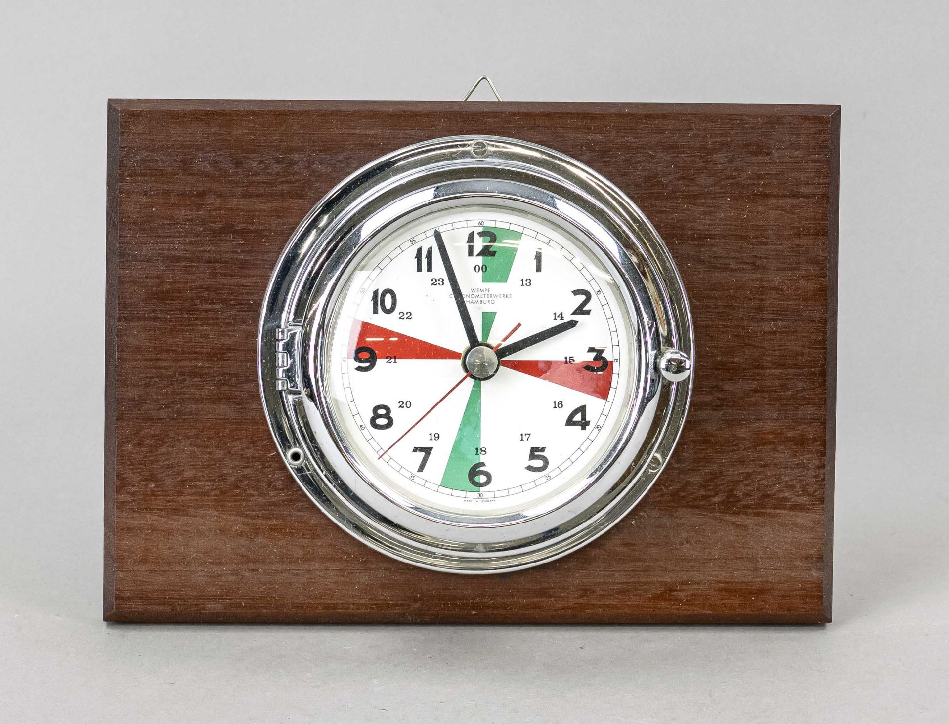Wempe ship's clock, chrome-plated, quartz movement, battery probably empty, mounted on wood, white