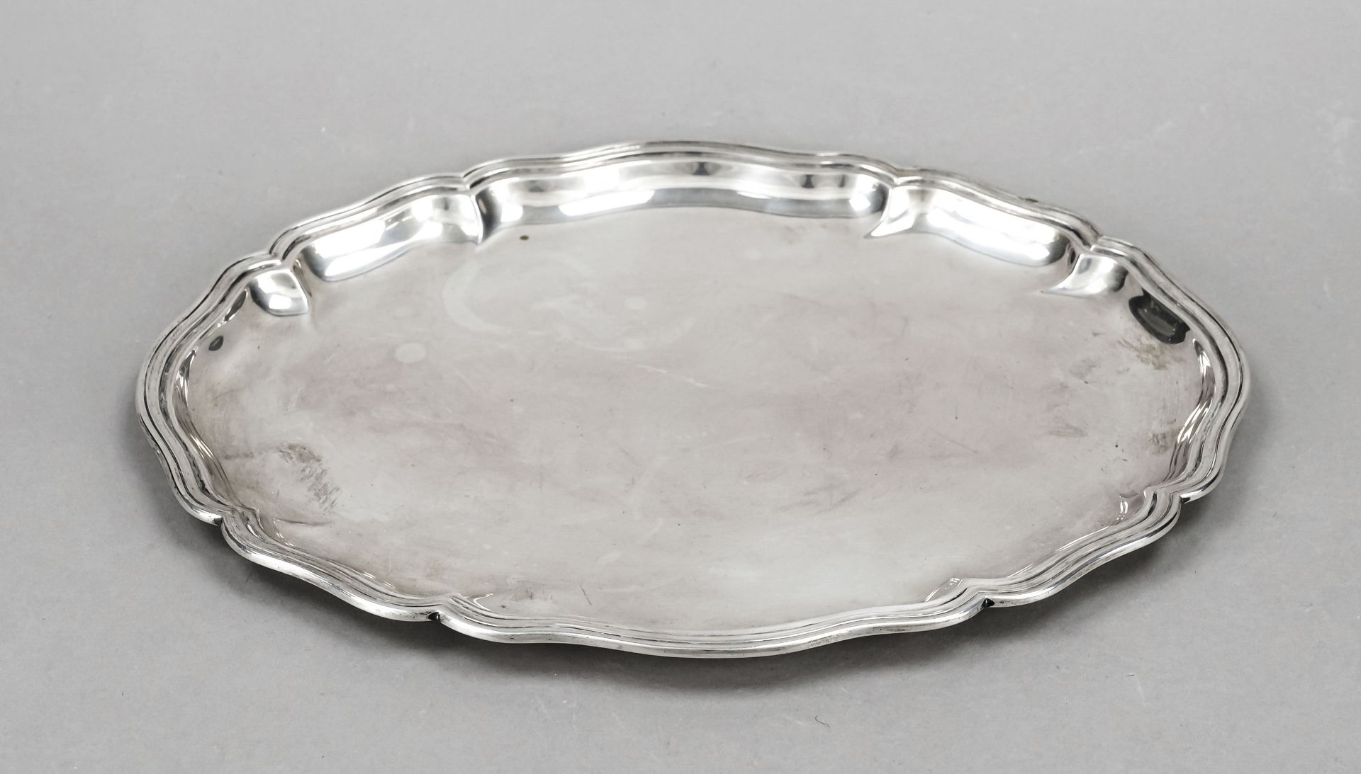 An oval tray, German, 20th century, maker's mark M. H. Wilkens & Söhne, Bremen-Hemelingen, silver