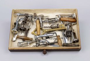 Collection of historical corkscrews, 19th/20th century, in an old wooden display case measuring 6