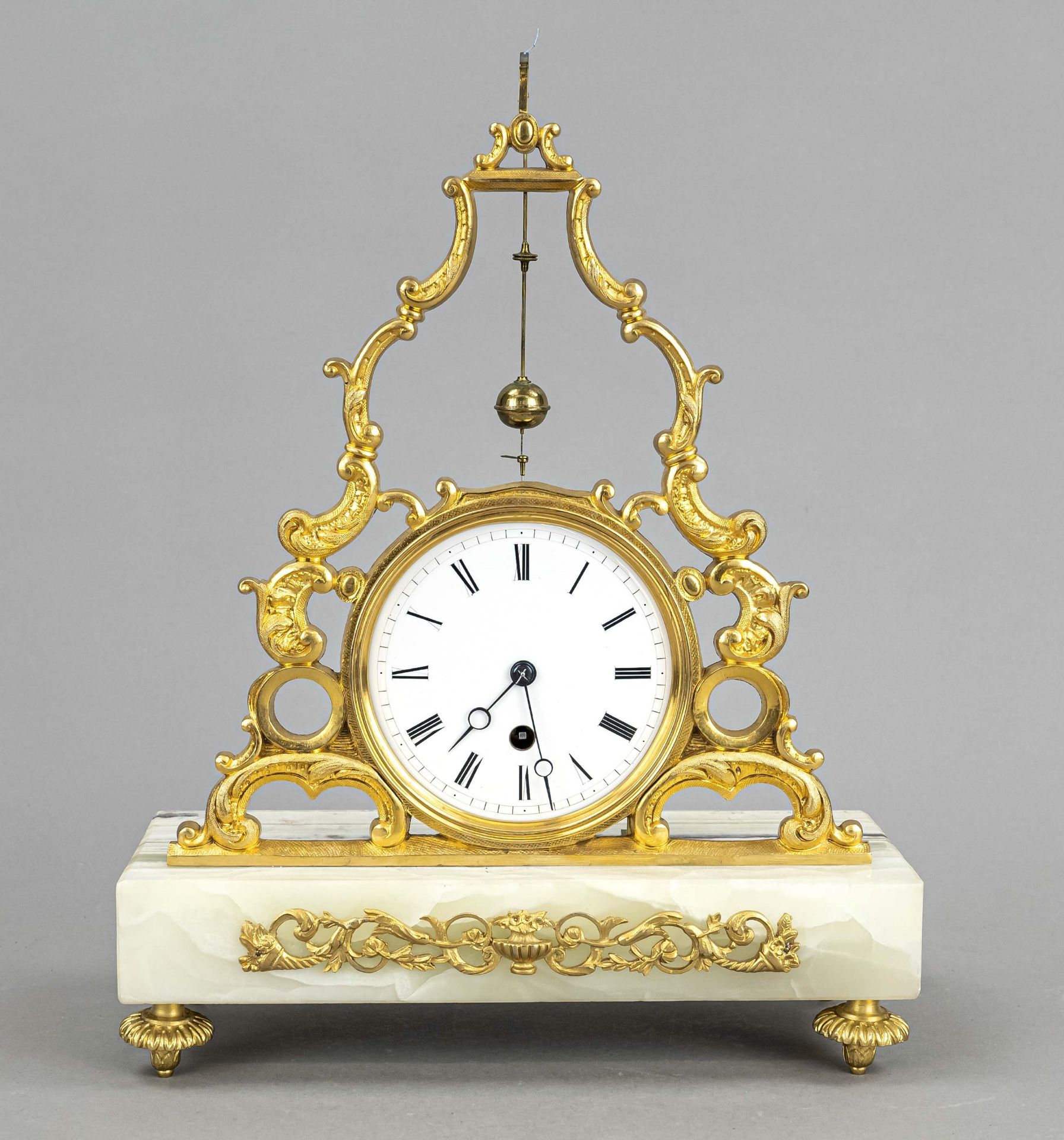 Table clock with fire-gilt body on onyx base, rocaille decorated with gilt roundels, white enamel - Image 2 of 2