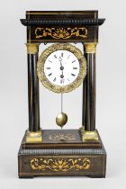 Portal clock marked C. Detouche St. Martin, 1st half 19th century, ebonized wood with light thread