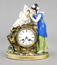 Porcelain pendulum, France, 2nd half 19th century, woman with child above a naturalistic rock,