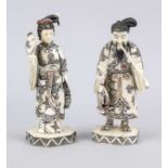 Pair of leg figures, Japan c. 1900 (Meiji). 1 x fisherman with pipe, 1 x lady with fan and flower