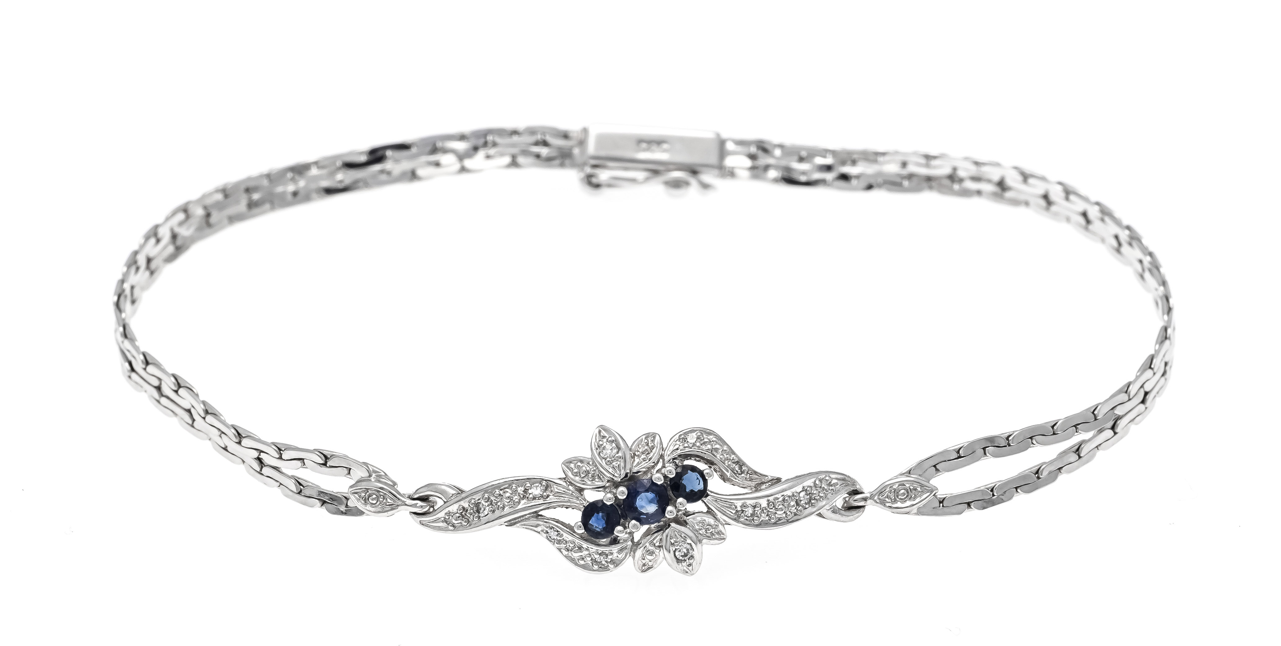 Sapphire-diamond bracelet WG 585/000 with 3 round faceted sapphires, 3 - 2.5 mm and 7 diamonds,