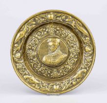 Basin bowl, German (probably Nuremberg), 16th/17th century, chased brass. In the mirror a portrait