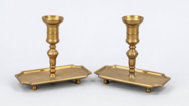Pair of small candlesticks, 19th century, bronze/brass. Balustrated on a rectangular tray base