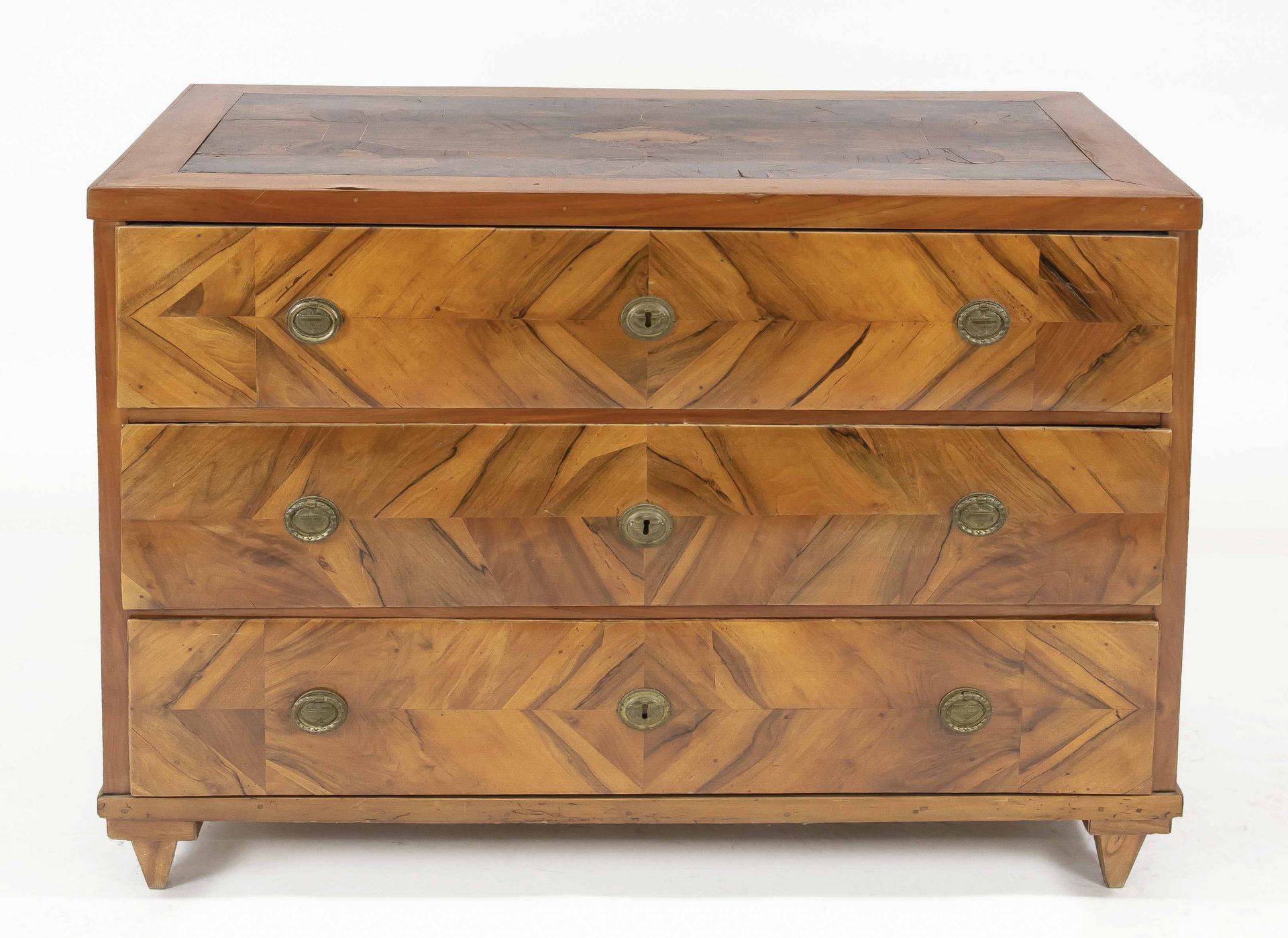 Empire chest of drawers from around 1800, walnut veneer, top inlaid with various precious woods,