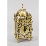 small lantern clock replica circa 1985, brass engraved and skeletonized, chapter ring with black