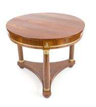 Biedermeier table, circa 1820, mahogany, triangular base with three full columns with brass