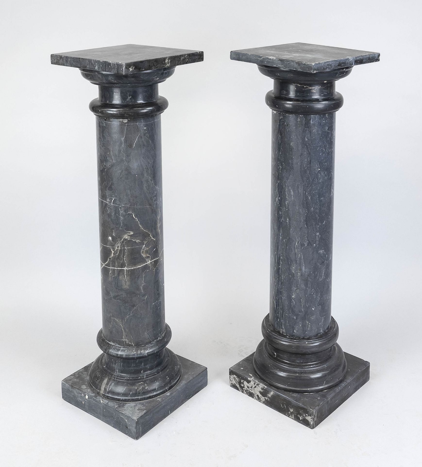 Pair of flower columns, 20th century, dark gray polished stone with natural pattern, smooth shaft