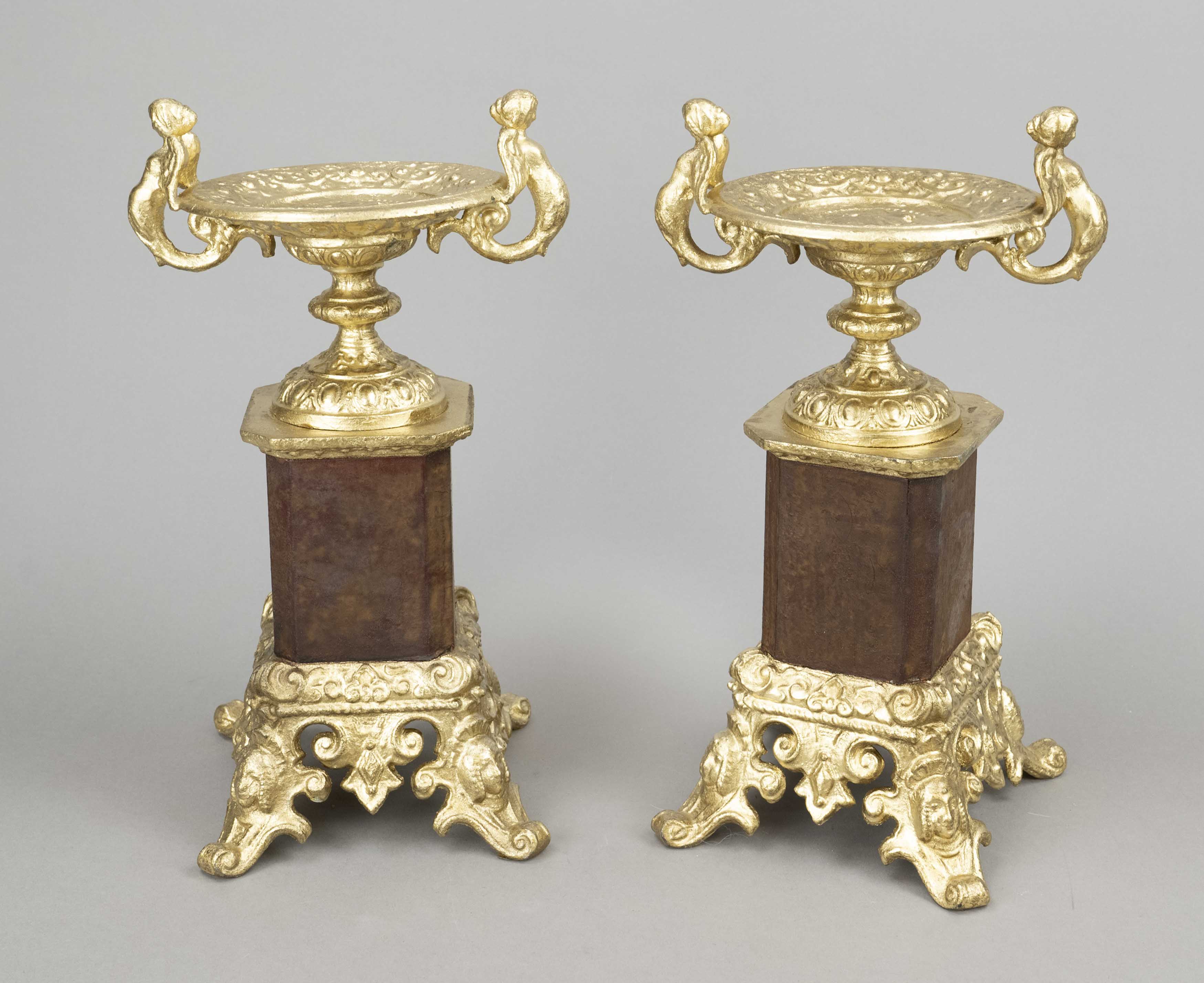 Pair of side plates, late 19th century, sheet iron with gilded and ornamented mounting, figural