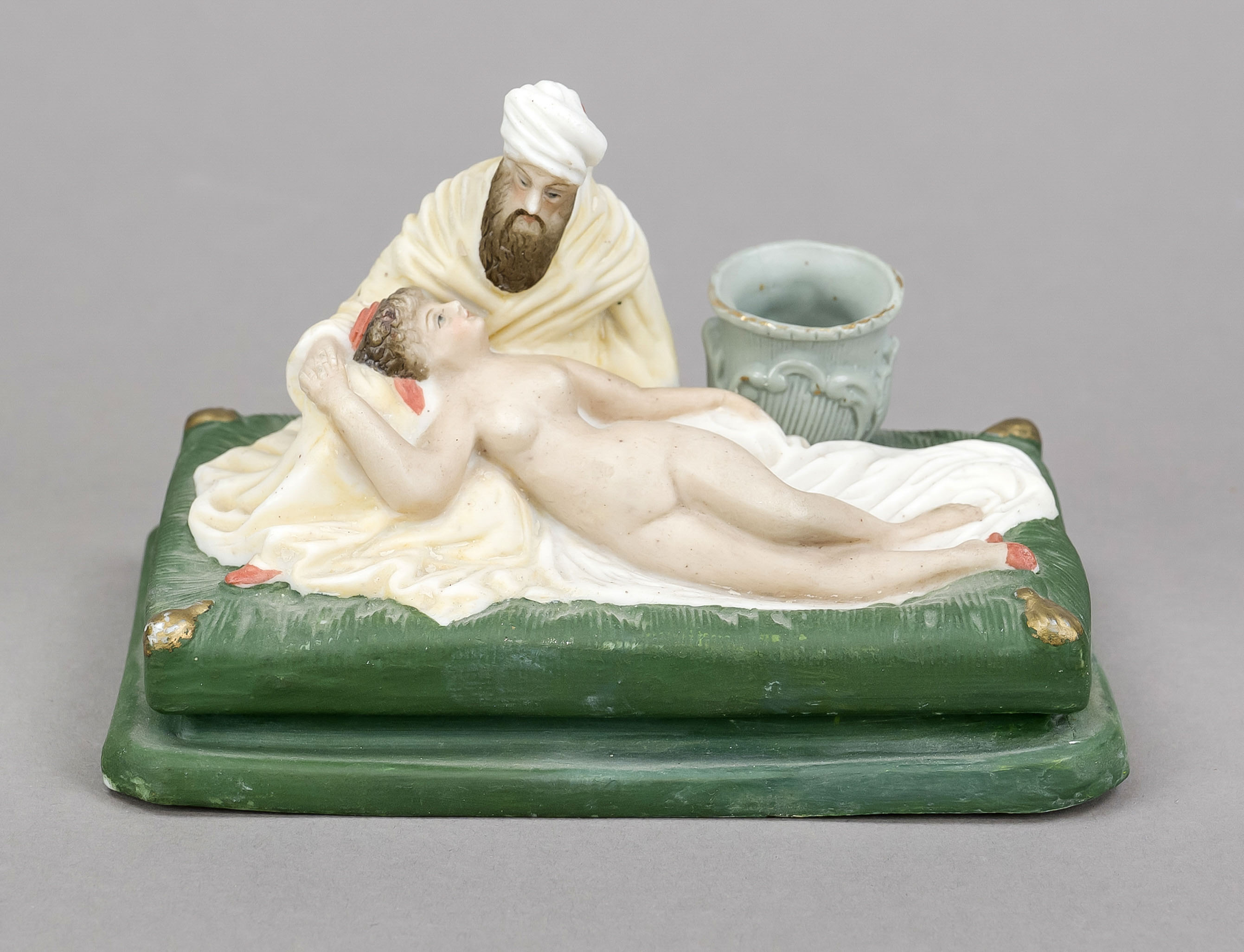 Erotic match holder, late 19th century, polychrome painted bisque porcelain. Nude beauty in the arms