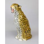 Large sitting leopard, 20th century, ceramic, naturalistically painted, snarling leopard as a