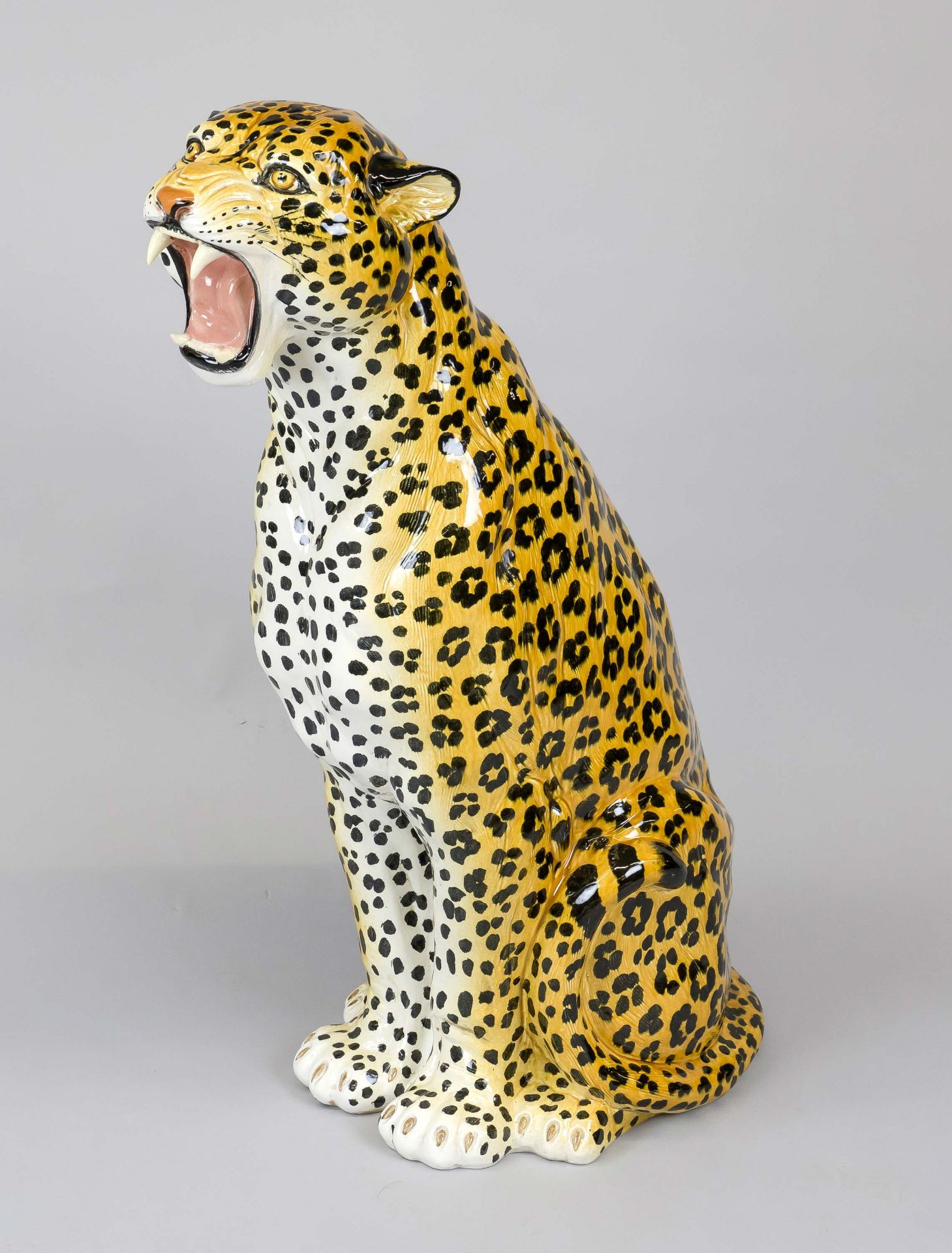 Large sitting leopard, 20th century, ceramic, naturalistically painted, snarling leopard as a