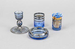 Four parts of a smoking set, 1st half 20th century, 2 vessels, candlestick and ashtray, bluish glass