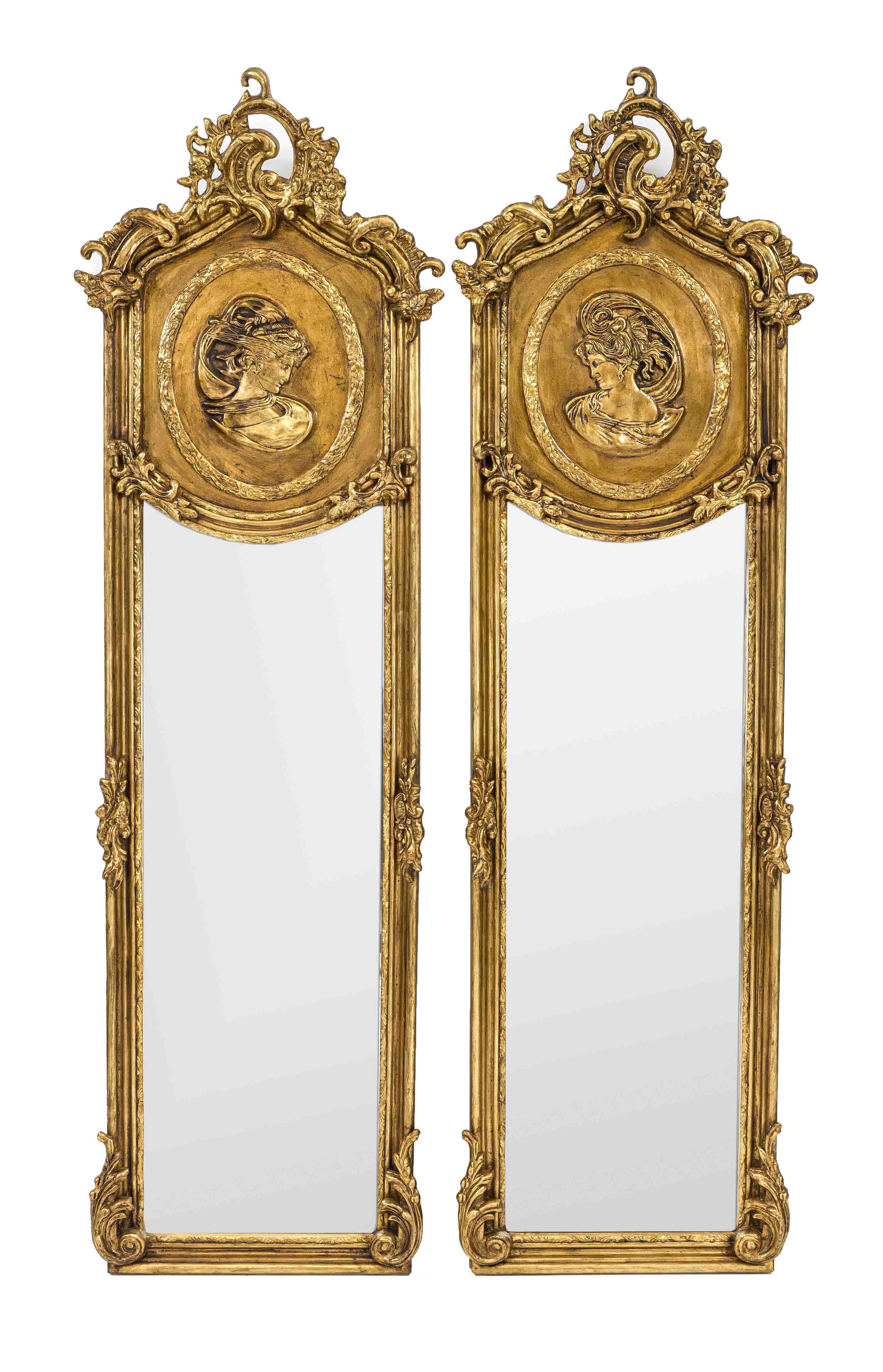 Pair of salon mirrors after an antique model, 20th century, stuccoed wood, gilded bronze, faceted