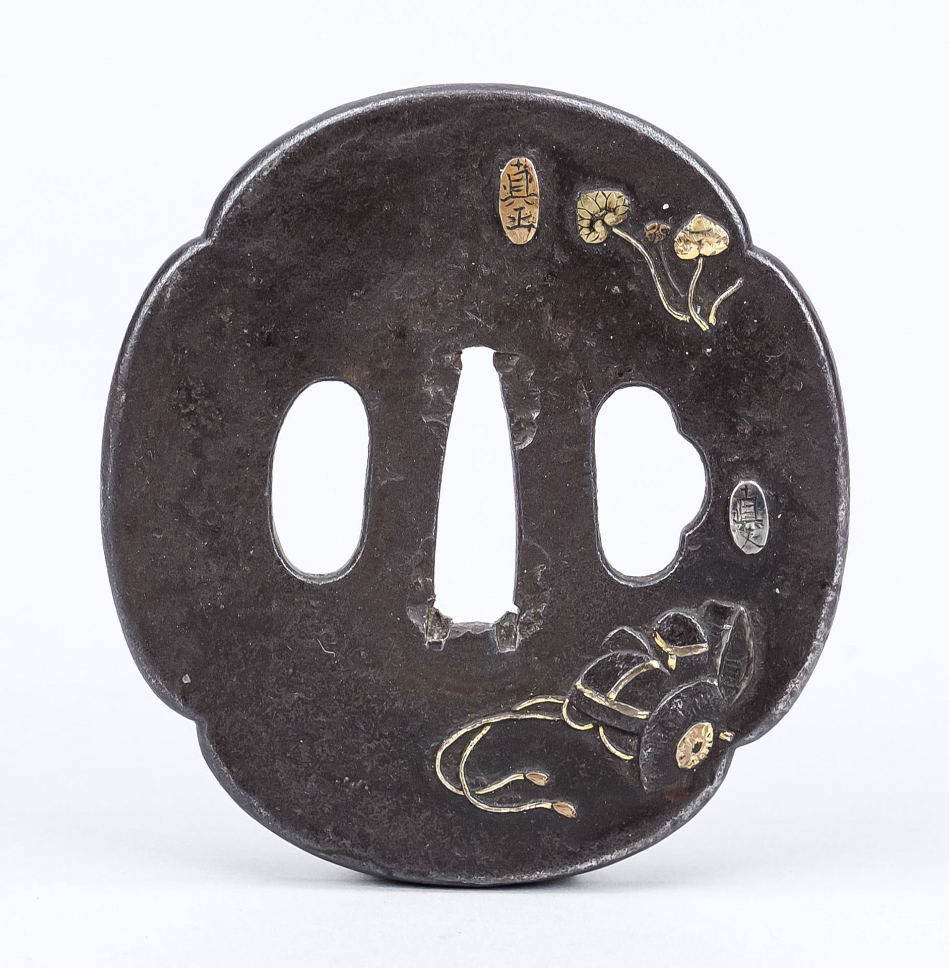 Tsuba (guard), Japan 18th/19th century (Edo period), iron with gold inlay. Mokko form with relief