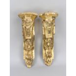 Pair of Baroque sconces, 19th century, carved and gilded wood, h. 31 cm