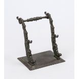 Pocket watch stand with pen rest, 19th century, dark patinated bronze. Two sloping arms with