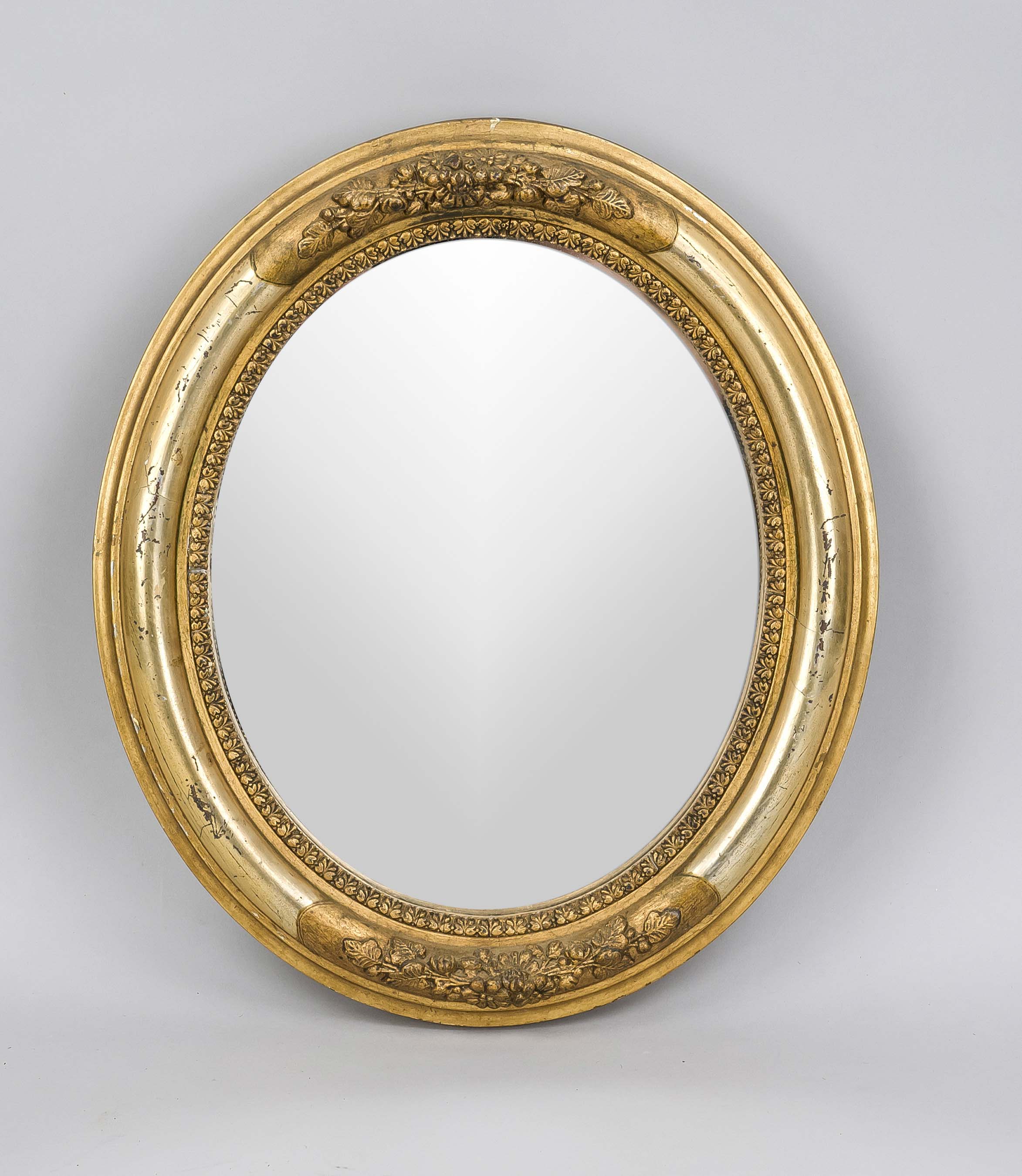 Mirror, 19th/20th century, oval wooden frame with sculpted floral decoration, gold painted,