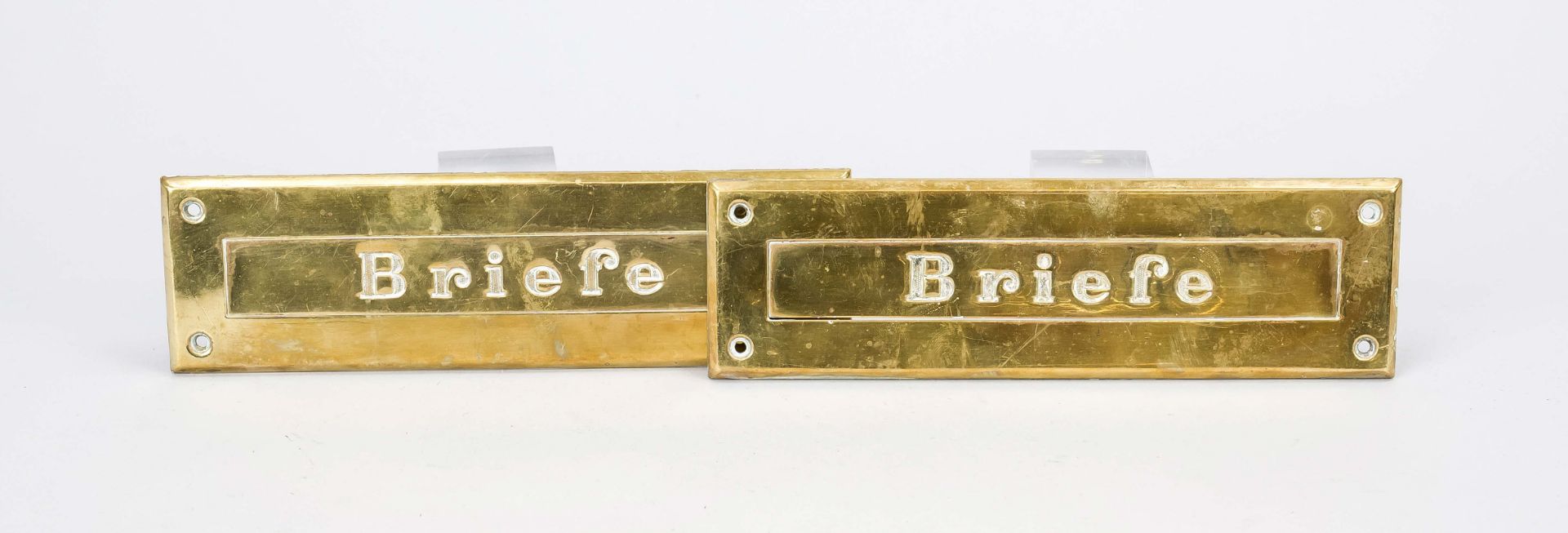 2 letter slot covers, 20th century, polished brass, each with inscription ''letterbox'', 23.5 x 6.