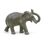 Bronze elephant with glass eyes, 20th century, inscribed ''Mexico'' on the underside, l. 13.5 cm