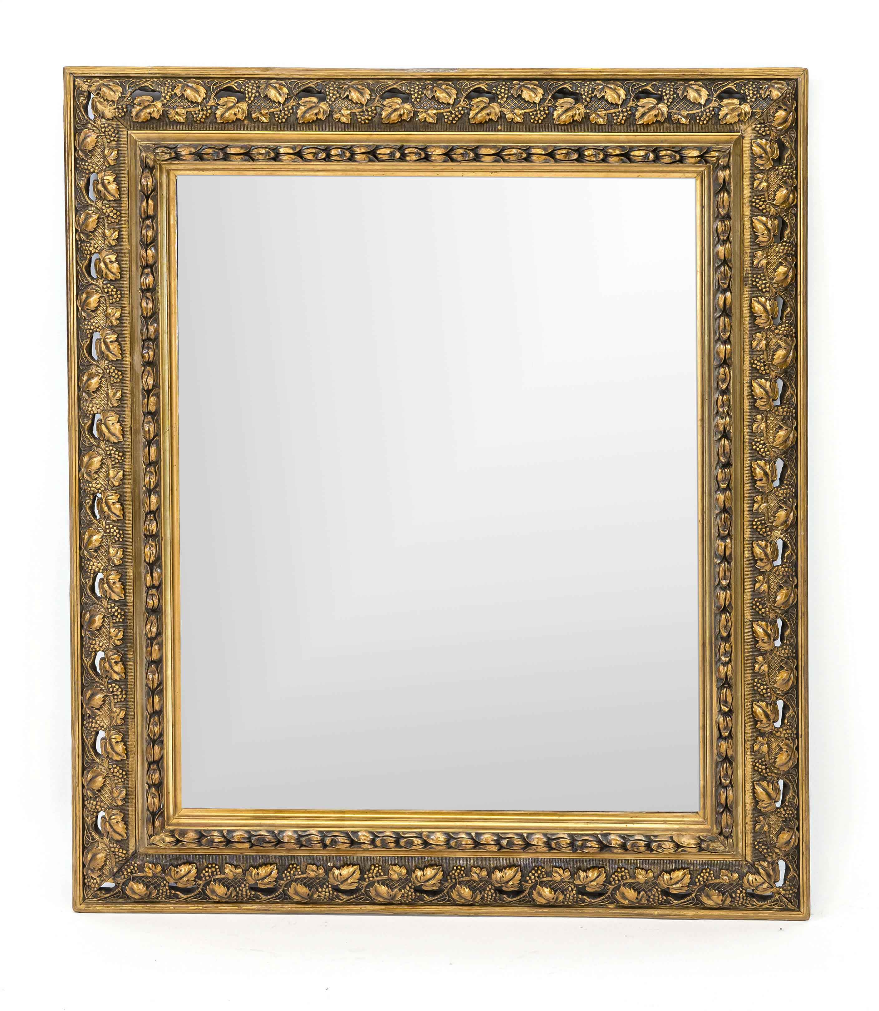 Wall mirror around 1900, stuccoed and gilded wooden frame, vine leaf relief, faceted mirror, 103 x