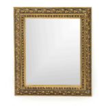 Wall mirror around 1900, stuccoed and gilded wooden frame, vine leaf relief, faceted mirror, 103 x
