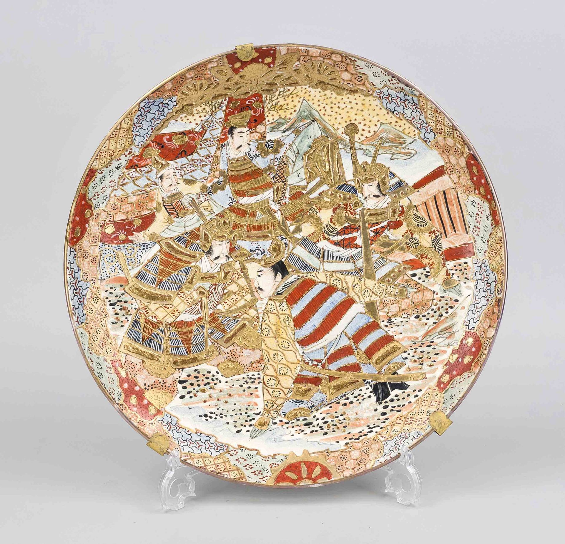 Large Satsuma plate, Japan, early 20th century, polychrome samurai decoration with lots of gold, old