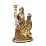 Figural candlestick, 20th century, carved wood and polychrome painted, seated figure in medieval