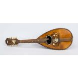 Mandolin, 19th/20th century, ribbed body, decorated with mother-of-pearl and ebony inlays, inside