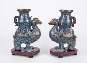 A pair of cloisonné phoenix vases, China 19th century (Qing). Standing phoenix with vase on its
