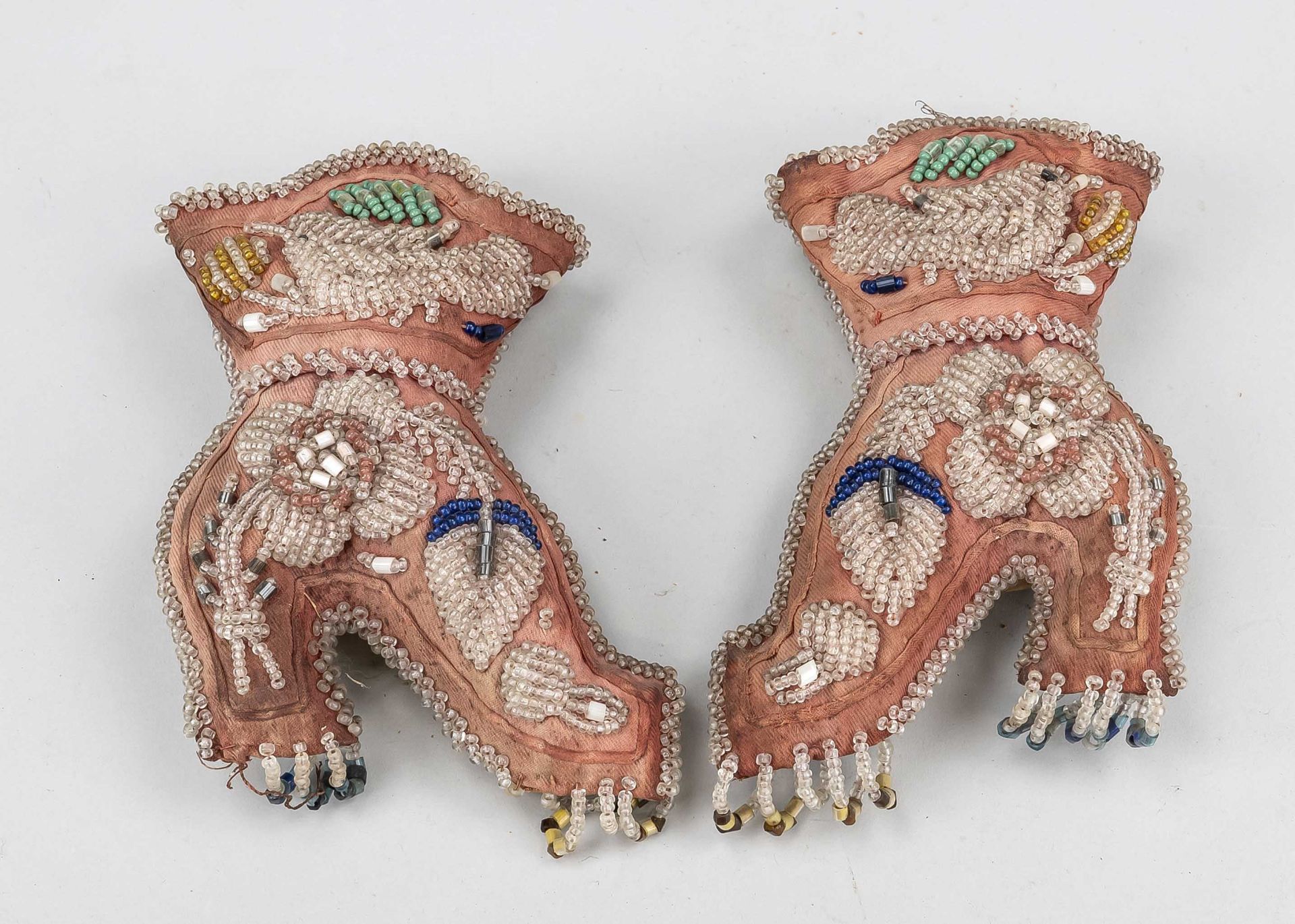 2 American pincushions, c. 1890, stuffed fabric body in the form of two shoes with colorful
