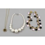 Two vintage costume jewelry necklaces and a necklace with pendant, gold- and silver-coloured