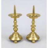 Pair of baroque candlesticks, 18th century, brass, round, shaft in baluster form, rising bell foot