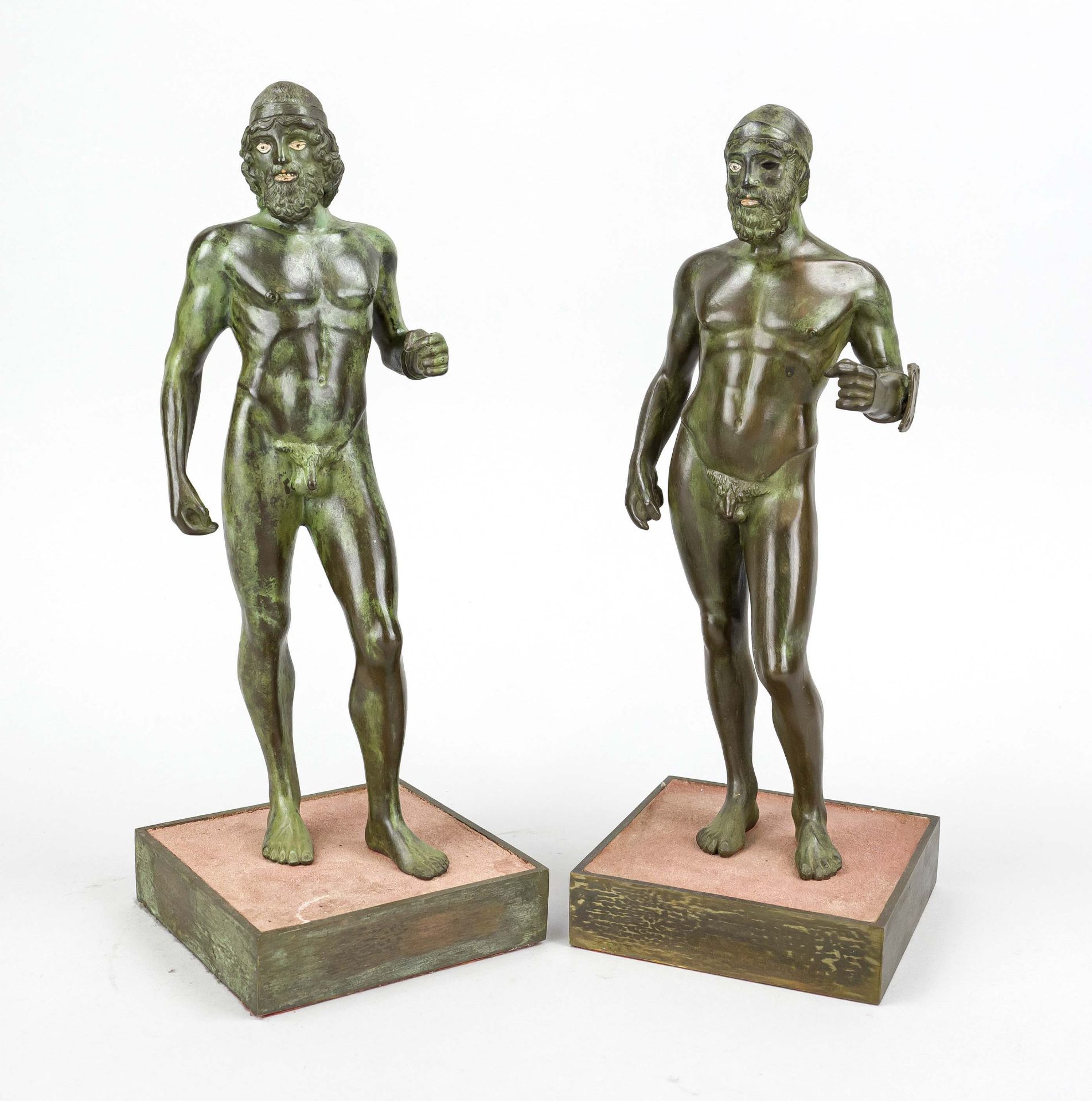 Two green patinated bronzes based on antique models, 20th century, plinth filled with terracotta,